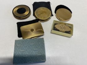 A selection of vintage ladies compacts including Stratton