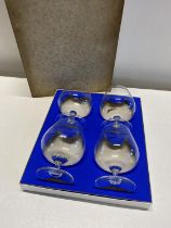 A box set of four glass brandy balloons, shipping unavailable