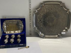 A case set of miniature goblets with tray and one other silver plated tray