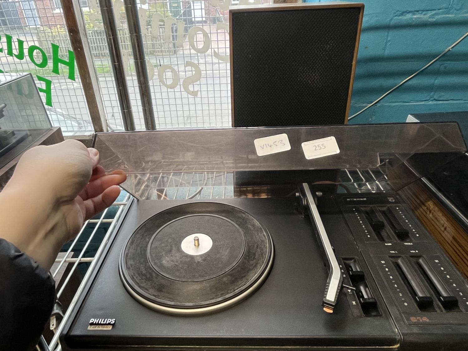 A vintage Phillips turntable and speaker (untested), shipping unavailable