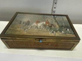 A bronze and wooden hunting themed box with a hand painted lid 23x14cm