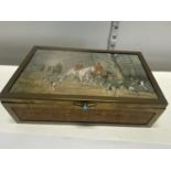 A bronze and wooden hunting themed box with a hand painted lid 23x14cm