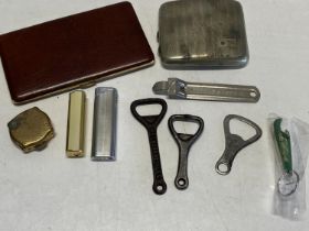 A selection of vintage smoking related items and selection of antique bottle openers