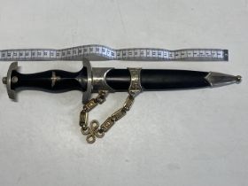 A reproduction German third Reich dagger and sheath, over 18's only, UK post only