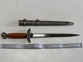 A reproduction German third Reich dagger and sheath, over 18's only, UK post only