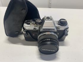 A Olympus OM-10 35mm camera (untested)