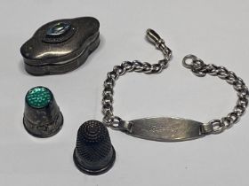 A Silver ID bracelet A hallmarked silver Charles Horner thimble & other white metal items.