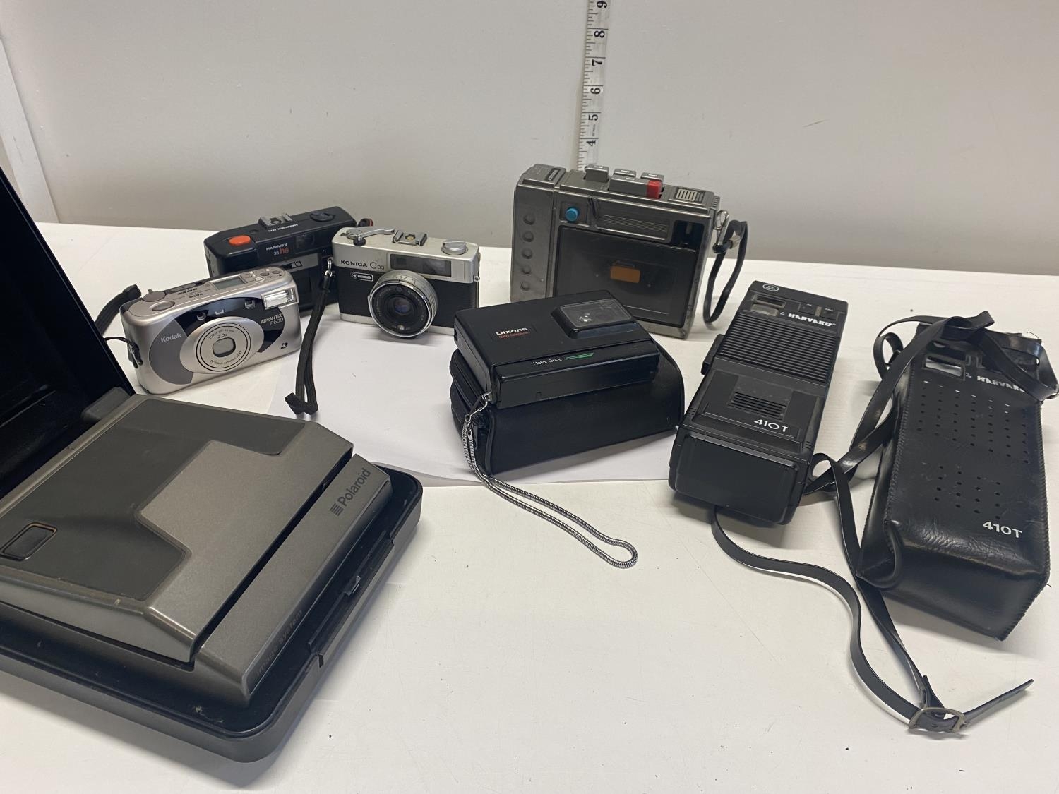 A selection of assorted vintage camera's including a CB Radio (untested)