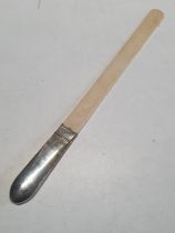 A silver handled Mappin and Webb page turner