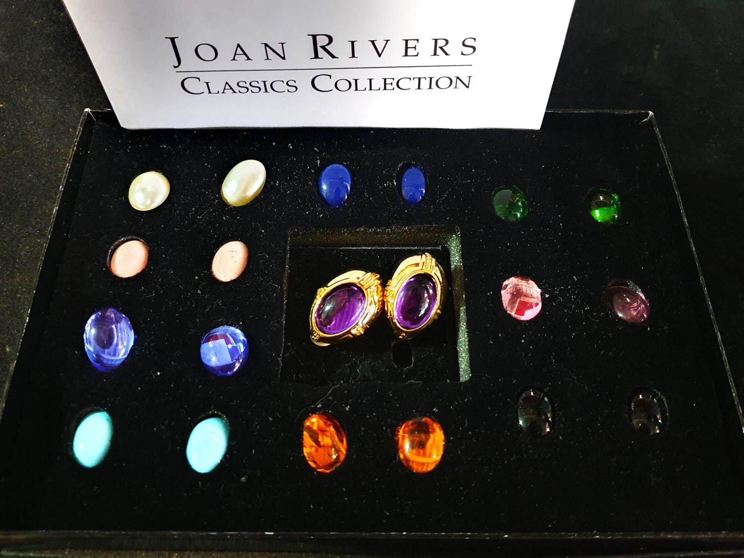 A boxed Joan Rivers interchangeable hoop earring set