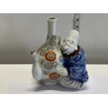 A Chinese 19th century porcelain wine jug (with damage) a/f, shipping unavailable