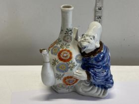 A Chinese 19th century porcelain wine jug (with damage) a/f, shipping unavailable