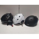 Three safety helmets, shipping unavailable