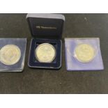 Three assorted collectable £5 proof coins