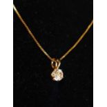 A 9ct Gold chain and pendant. 2.64g