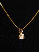 A 9ct Gold chain and pendant. 2.64g