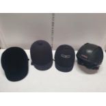 A selection of riding helmets, shipping unavailable