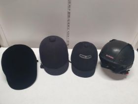 A selection of riding helmets, shipping unavailable