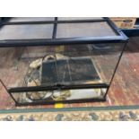 A reptile tank complete with accessories and heat pad 61x48cm, shipping unavailable