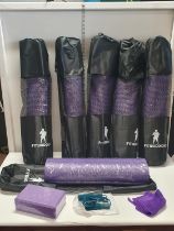 A box of 6 Fitwarrior yoga mat kits including mat, skipping rope towel and foam brick