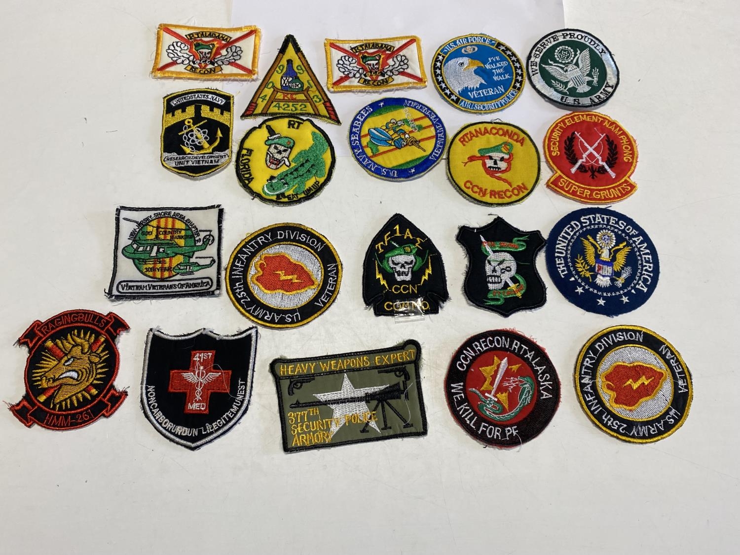 A job lot of Vietnam war period reproduction American cloth patches.