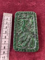 A 18th century Chinese Jade plaque of a dragon on one side and phoenix on the other