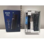A boxed as new Oral B electric toothbrush (untested)