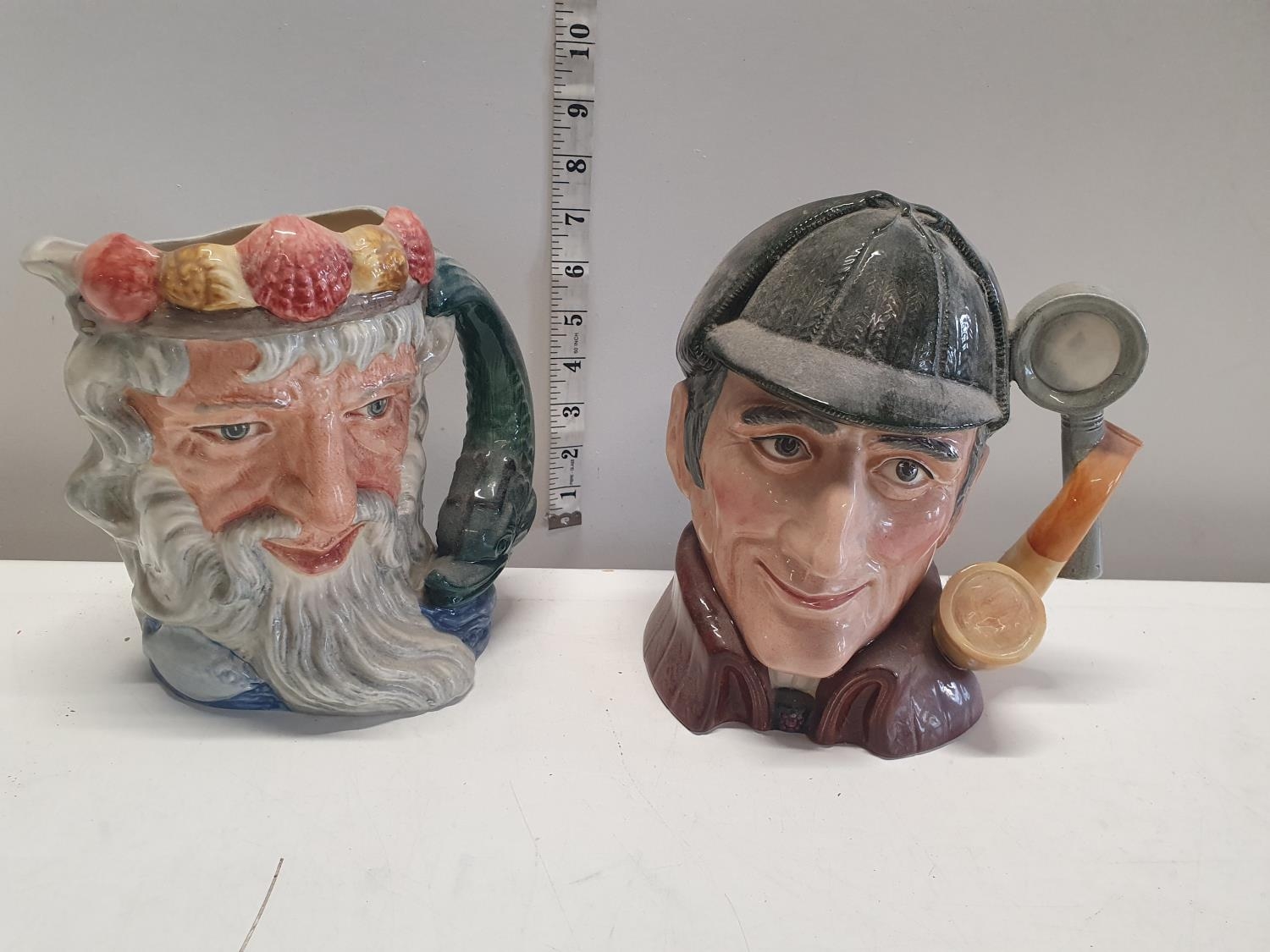 Two Royal Dalton character jugs. Neptune and The Sleuth, shipping unavailable