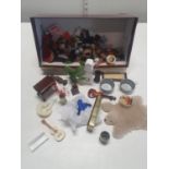 A selection of vintage dolls house accessories