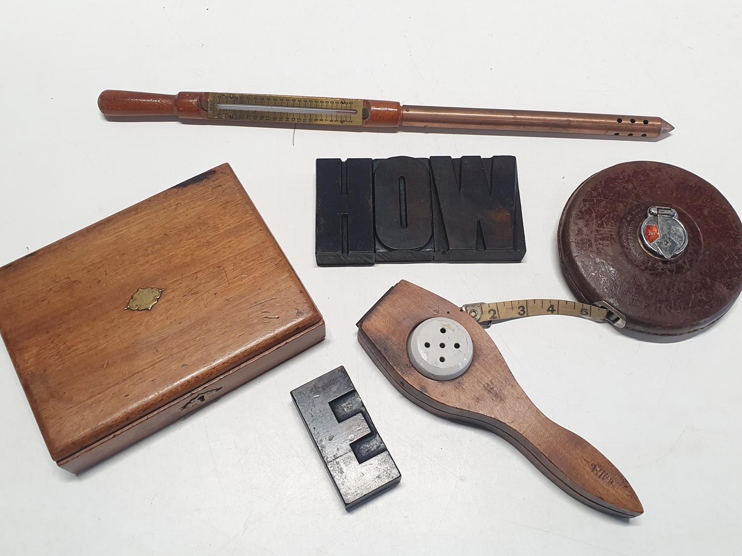 A selection of vintage treen items and a Rathbone tape measure