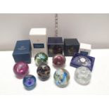A selection of mostly boxed paperweights including Caithness.Shipping unavailable
