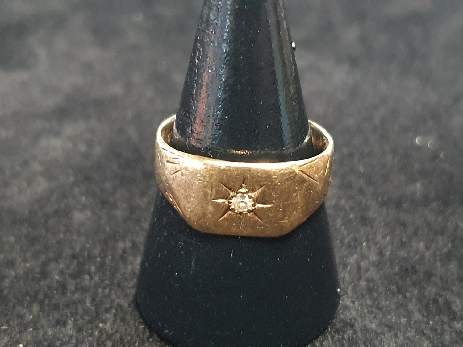 A 9ct gold and diamond ring. Size Q. 3.87g