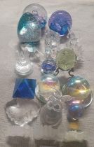 A selection of glassware's including paperweights and Swaroski. Shipping unavailable