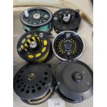 Six assorted fly fishing reels including Shakespeare