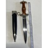 A reproduction German third Reich dagger and sheath, over 18's only, UK post only