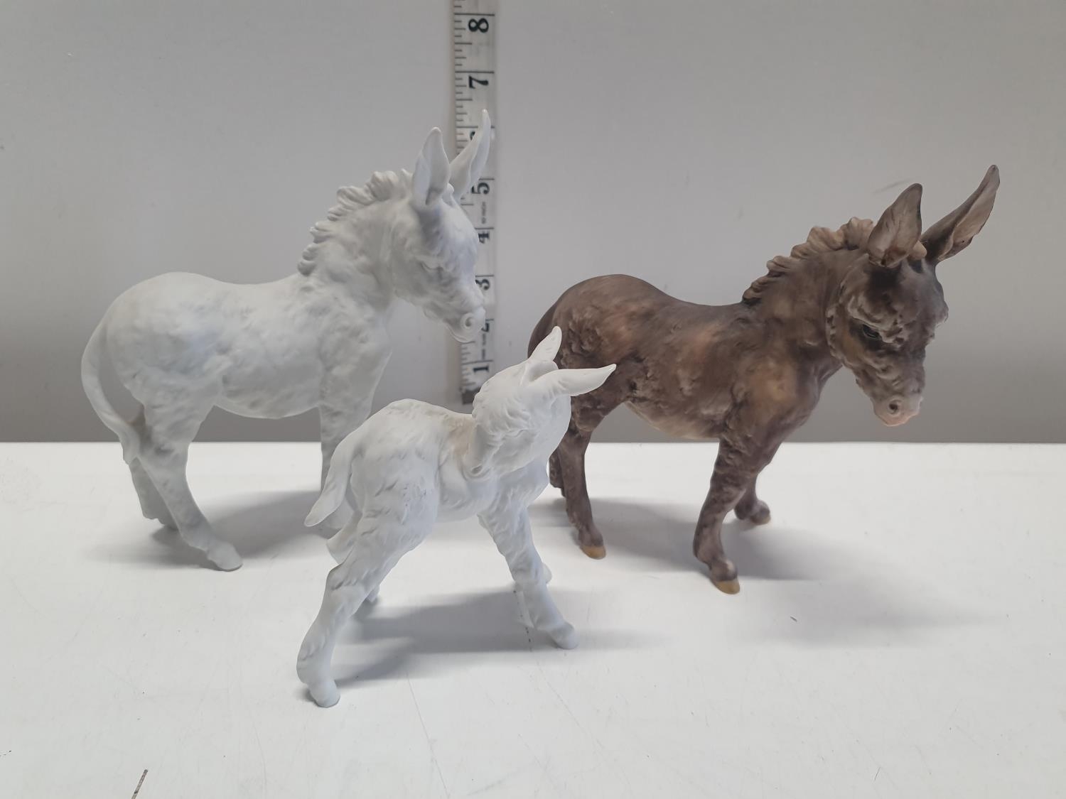 Three kaiser pottery donkeys.Shipping unavailable