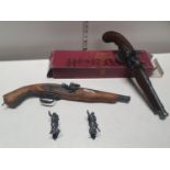 A boxed Armas antiguas wall hanging Flintlock pistol and one other