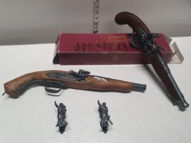 A boxed Armas antiguas wall hanging Flintlock pistol and one other