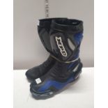 A pair of xp5 motorcycle boots size 9