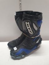 A pair of xp5 motorcycle boots size 9