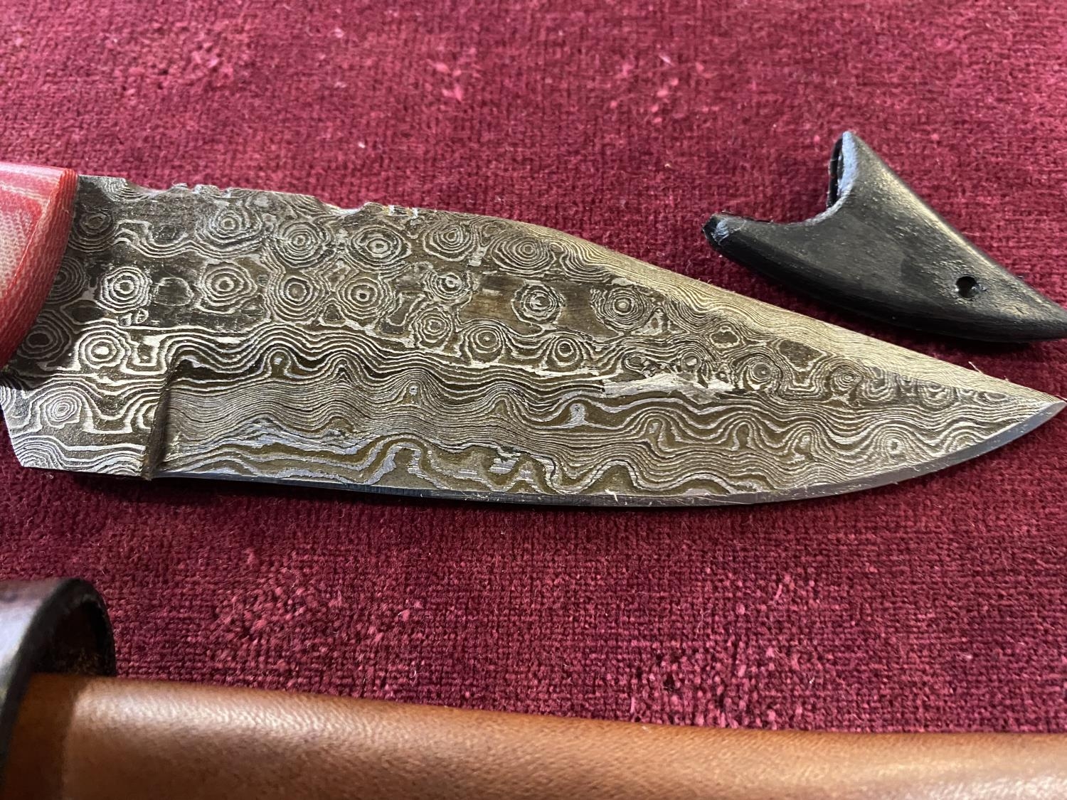 A hand forged Damascus steel bladed knife in leather sheath, over 18's only, UK post only - Image 2 of 3