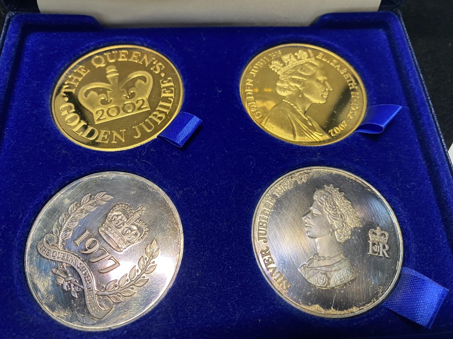 A Sterling silver plated & gold plated four coin set & a 1983 UK UNC coin set. - Image 2 of 3