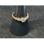 An antique 18ct Gold and platinum diamond solitaire ring. size M. 2.44g
