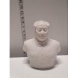 A ceramic bust of Chairman Mao Zedong