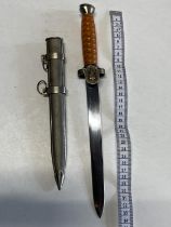 A reproduction German third Reich dagger and sheath, over 18's only, UK post only