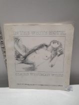 A copy of 'In the White Hotel' by Claire Weissman Wilks - erotic poems