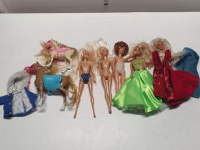 A selection of vintage dolls including Barbie and Cindy etc