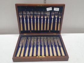 A silver plated cased set of vintage cutlery