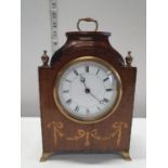 An antique Swiss made mantel clock with a makers mark of Fabrique d'Horlogerie de Fontainemelon