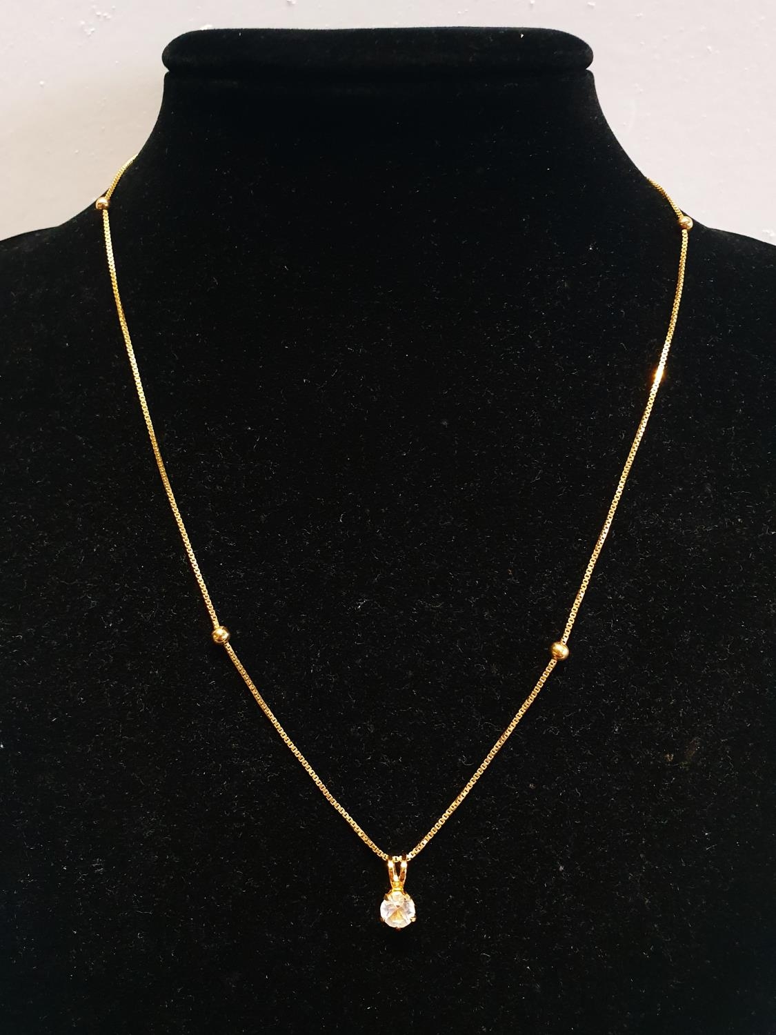 A 9ct Gold chain and pendant. 2.64g - Image 2 of 2